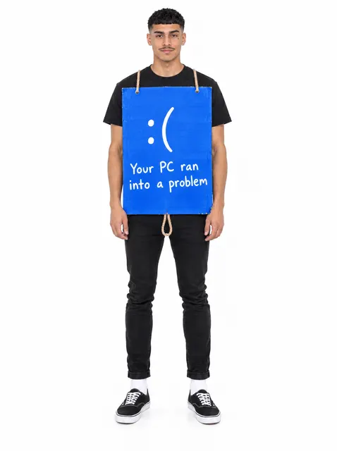 The Blue Screen: a DIY Halloween costume made from cardboard, worn by a model