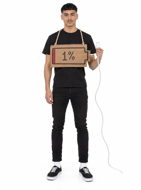 1% Battery: a DIY Halloween costume made from cardboard, worn by a model